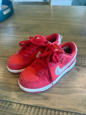 Nike Kids Red Low-Top Sneakers with White Swoosh